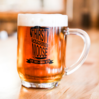 thirsty moose branded glass with beer