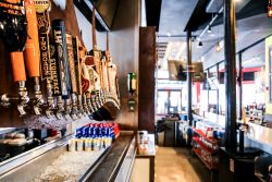 Selection of beer taps behind the bar